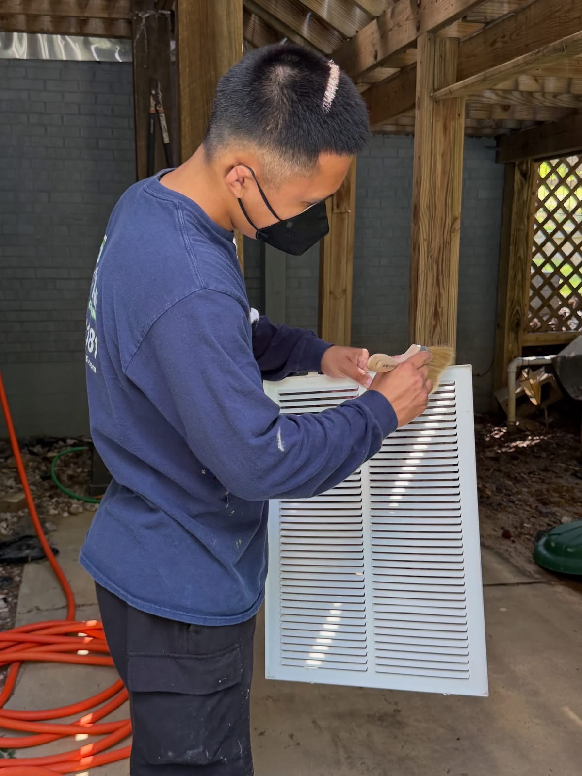 Pristine technician checking HVAC service work